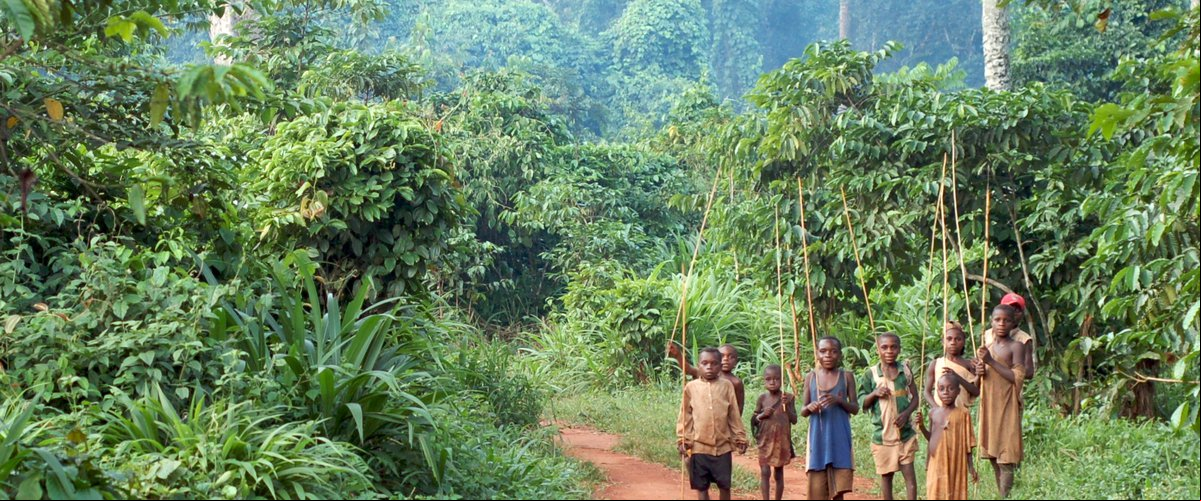 Aka boys posing with spears